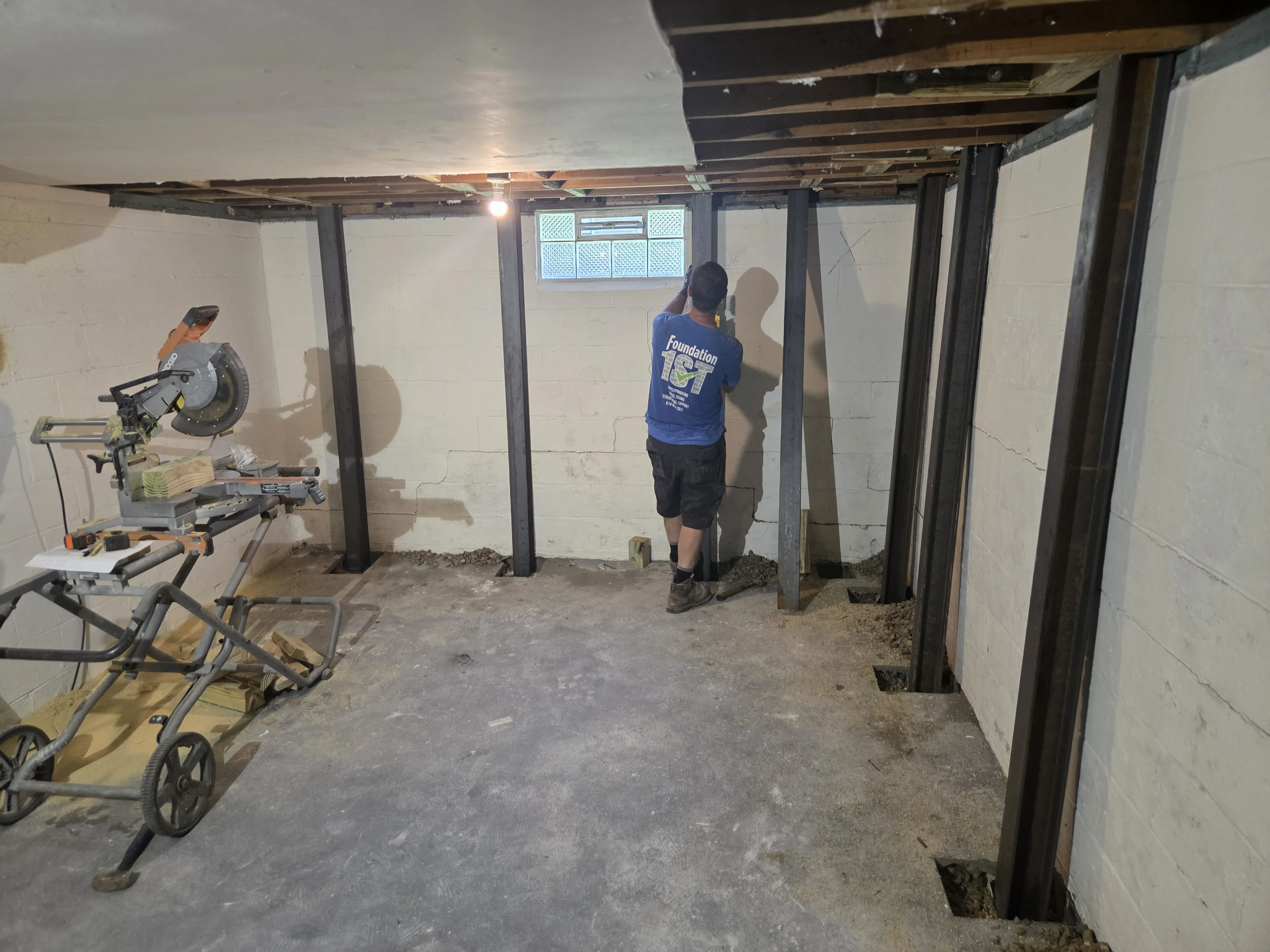 Steel I-beams installed along basement walls in Columbus Ohio